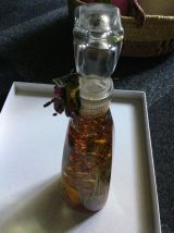 Vintage grande bouteille d.huile de bain fleurs sèches 