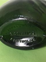 Bouteille de forme atypique en verre vert/bouchon à vis