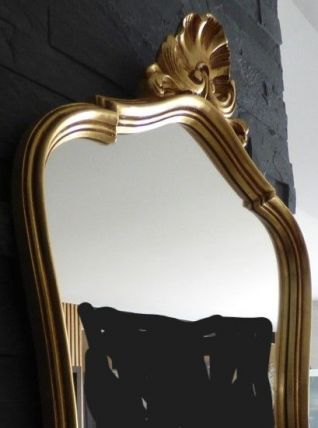 Grand miroir de style louis XV , chic avec son encadrement à