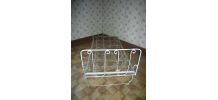 lit cage en fer forge sur roulettes