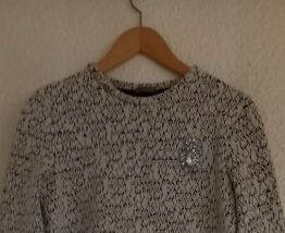 Pull zara avec broche