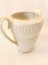 Ravissant pot à lait en porcelaine art déco liseré or