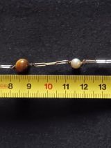 Bracelet en plaqué or jaune et pierres oeil de Tigre