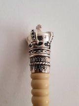 Set couverts de service aux couronnes 