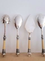 Set couverts de service aux couronnes 