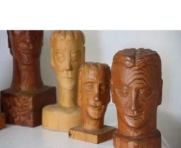 Jo Schinkel - Statues en bois de bustes de visages masculins