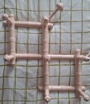 Porte manteaux accordéon rose pâle 