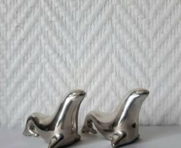 Porte-couteaux vintage phoques en métal argenté 