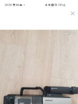 Camera et poste radio cassette 