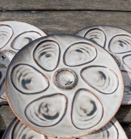7 assiettes huîtres Vallauris de G. Hoffman