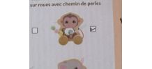 Animal roulant avec piste de perles ( Le singe )