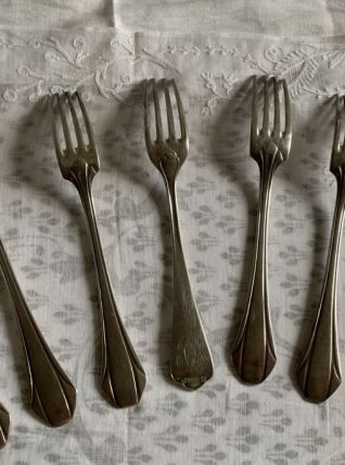 Lot de 8  fourchettes en metal argenté avec poinçons 