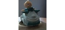 Figurine Casse bonbon dans son porteur 