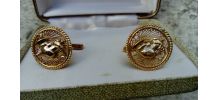 Paire de boutons de manchette plaqué or avec buste de femme 