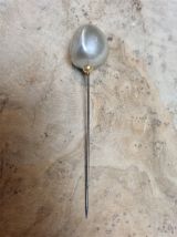 Épingle à chapeau
