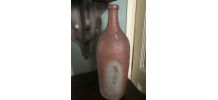 Bouteille ancienne en terre cuite