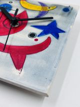 Horloge en céramique de style Joan Miro