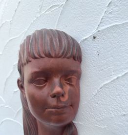 Tête de femme en céramique