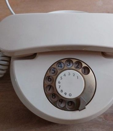 Ancien téléphone rond TELCER  ivoire