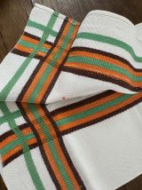 Serviettes de table vintage en orange et vert.