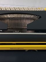 Remington riviera, jaune,machine à écrire révisée