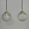 PAIRE D’ANCIENNES SUSPENSIONS RONDES EN VERRE VINTAGE 