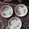 3 sous-tasses porcelaine fleurie estampillées Royal Albert.