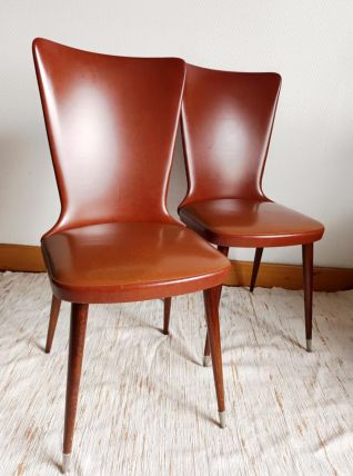 Paire de chaises Skaï vintage pieds compas 