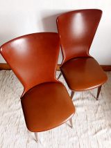 Paire de chaises Skaï vintage pieds compas 