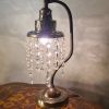 lampe ancienne 1900 a 20 laiton a pampille de  cristal ,verr