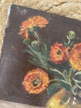 Nature morte bouquet de soucis dans un vase.