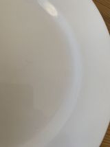 Assiettes plates faience blanche annees 70/80.
