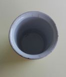 Ancien pot à confiture en terre cuite émaillée blanche