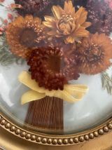 Cadre médaillon de fleurs séchées des annees60.