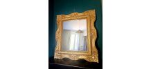 Grand miroir en bois doré 