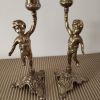 Paire de bougeoirs vintage en laiton sculpté.