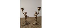 Paire de bougeoirs vintage en laiton sculpté.