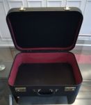Valise noire vintage en bon état