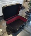 Valise noire vintage en bon état