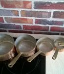 Batterie de casseroles en cuivre étamé