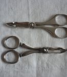 2 pinces a sucre forme ciseaux en metal argenté