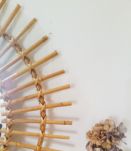 Grand miroir soleil rotin années 60