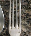 9 fourchettes et 7 cuillères à soupe en métal argenté