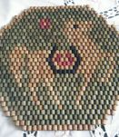 Dessous de plat ancien en perles de bois Travail artisanal