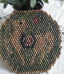 Dessous de plat ancien en perles de bois Travail artisanal