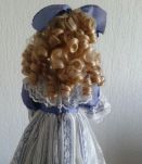 Poupée visage en porcelaine