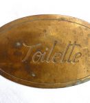 plaque  en laiton  ancienne  toilette