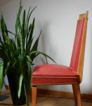 chaise design  années 50 de couleur rouge
