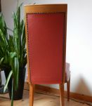 chaise design  années 50 de couleur rouge