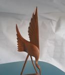 couple d'oiseau sculptés en bois clair